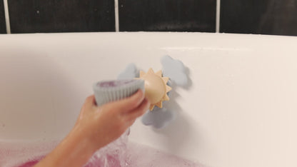 Mushie Spinner Sonne Lernspielzeug mit Saugnapf